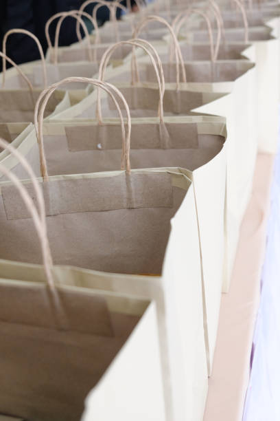 istock Brown paper bags in rows. Ecology concept. Close up 1069124848