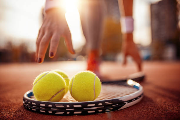 istock Woman playing tennis 1069134342
