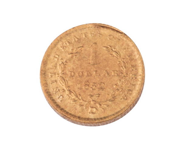 istock one gold 1852 dollar coin isolated on white background 1069134382