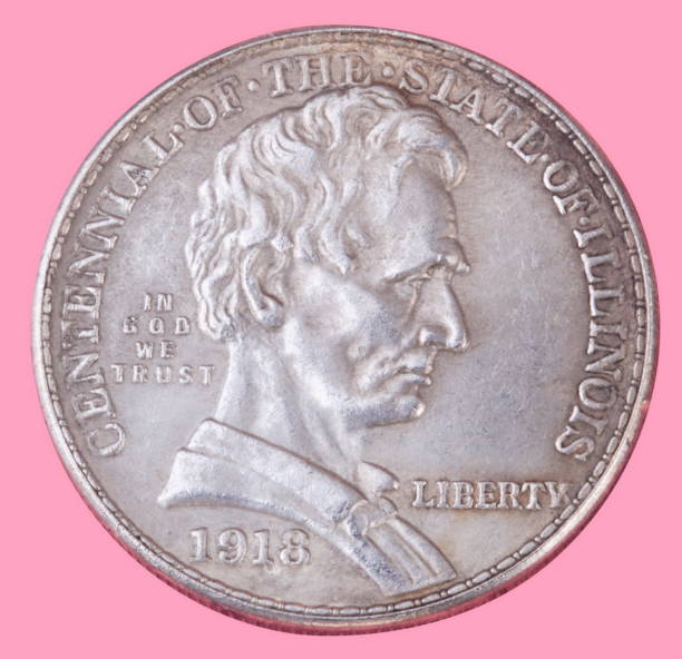 istock half dollar coin isolated on pink background 1069134618