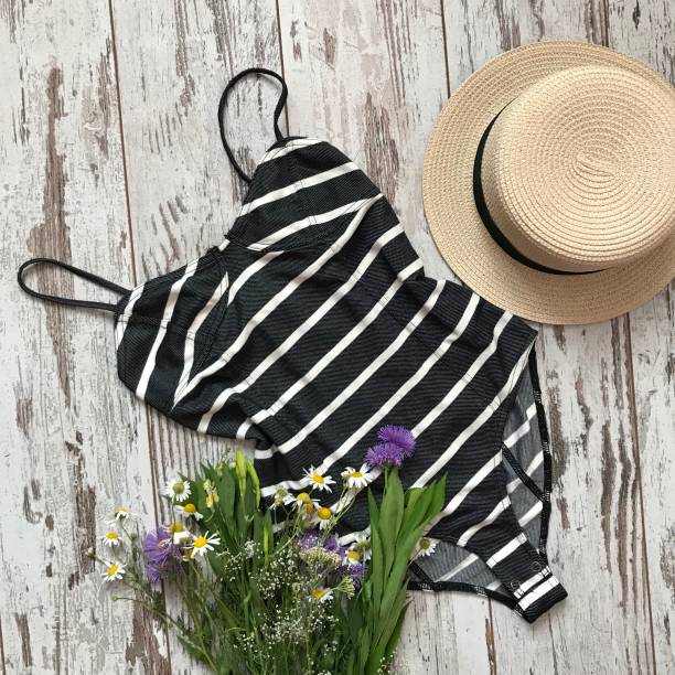 istock Shirt in stripes on a wooden background 1069136564