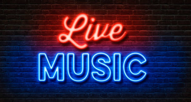 istock Neon sign on a brick wall - Live Music 1069136682