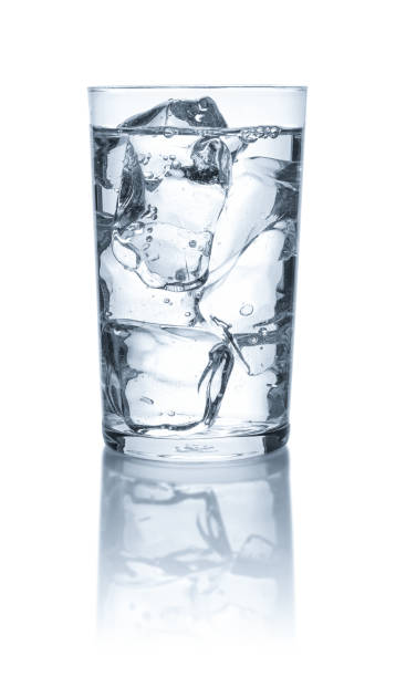 istock A glass with water and ice cubes on a white background 1069136842