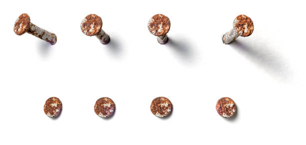 Rusty nail from different perspectives on a white background Rusty nail from different perspectives on a white background rusty nails stock pictures, royalty-free photos & images