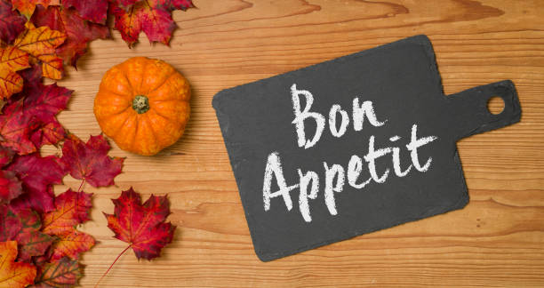 istock Autumn foliage with a blackboard - Bon Appetit 1069137318