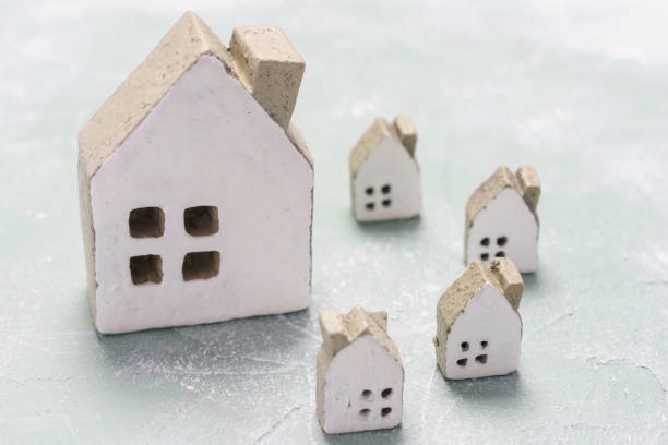 istock Wooden houses on a white background 1069137828