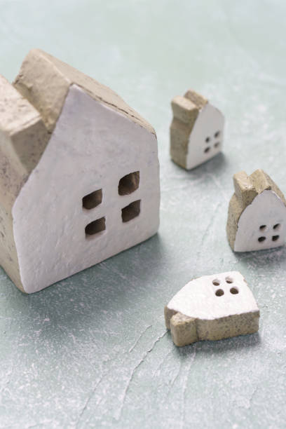 istock Wooden houses on a white background 1069137882