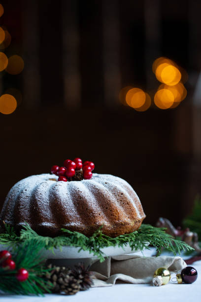 istock Rustic style Christmas bundt cake sprinkled with icing sugar. 1069146198