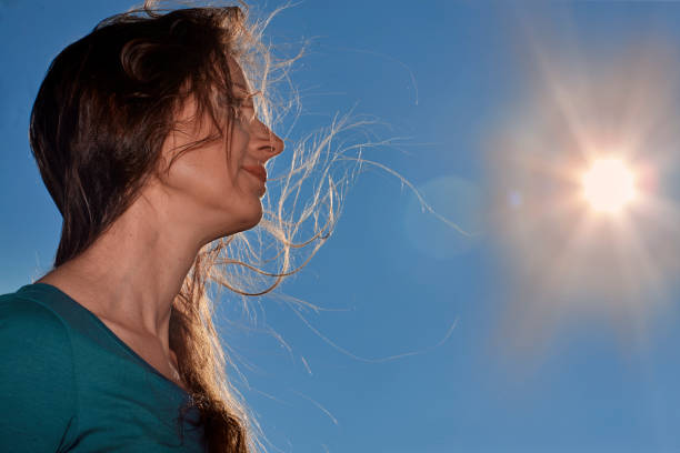istock Woman in the sun 1069150488