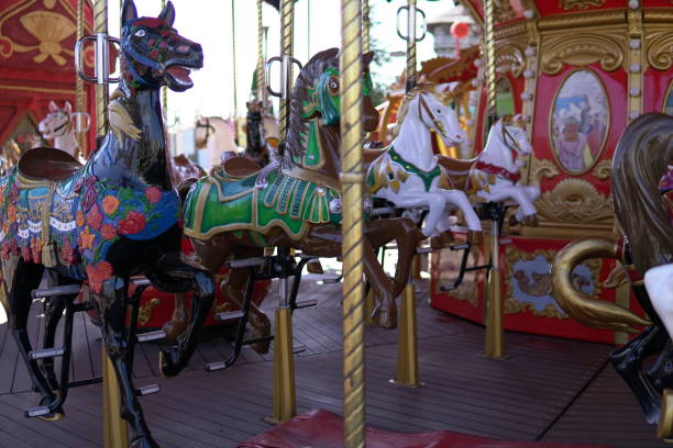 istock Carousel for children with horses attractions in the Park 1069150818
