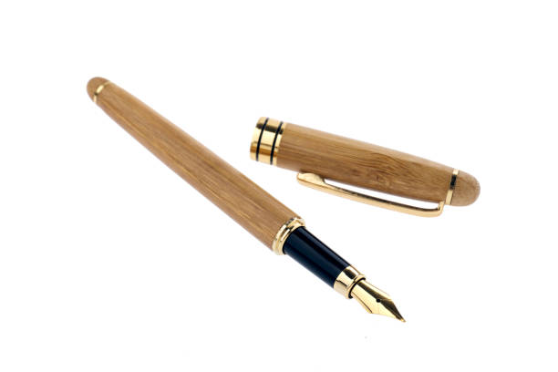 istock wood fountain writing pen isolated on white background 1069155620