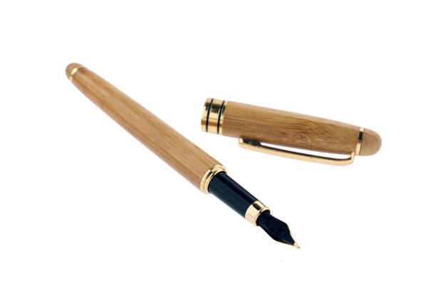 istock wood fountain writing pen isolated on white background 1069155698