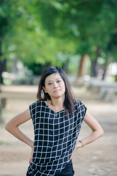 istock Asian woman posing at camera 1069159554
