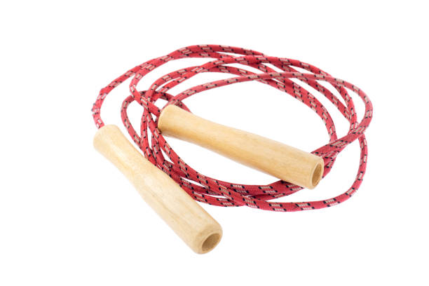 red skipping rope with wooden handles isolated on white with clipping path