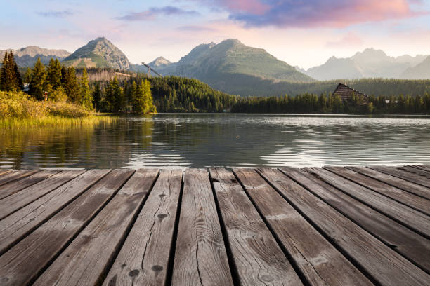istock Alpine mountain lake sunny morning view 1069167800