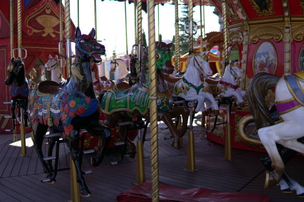 istock Carousel for children with horses attractions in the Park 1069169544