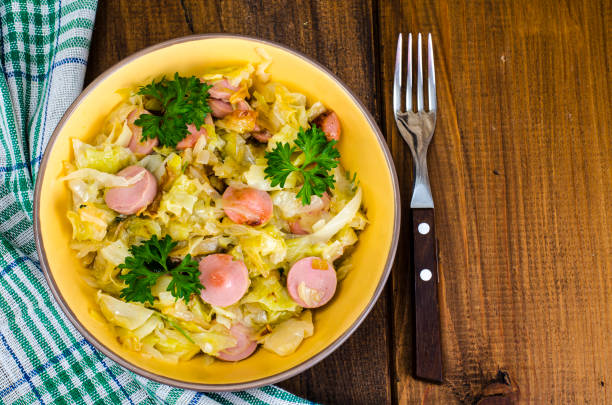 istock Stewed cabbage with slices of sausages 1069176186
