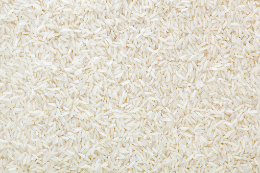 Fondo sin cocer arroz blanco de grano largo photo