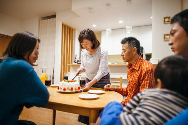 istock Three generation family having birthday party at home 1069182706