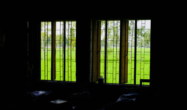 istock Windows of a dark room isolated unique photo 1069186054