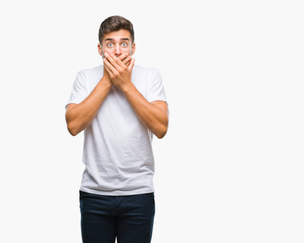 istock Young handsome man over isolated background shocked covering mouth with hands for mistake. Secret concept. 1069188736