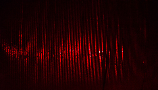 Red lights reflection on a metallic surface unique photo