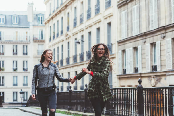 istock Joyful women enjoying Paris together 1069192648