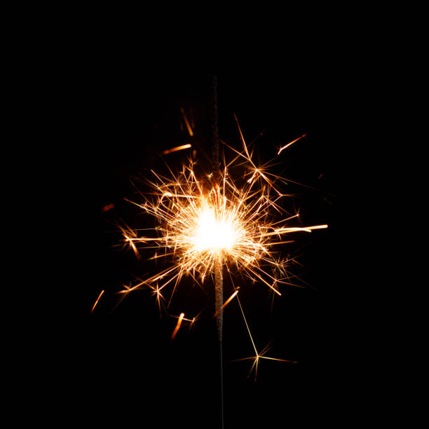 istock New year sparkler candle isolated on black background. Party backdrop. 1069198614