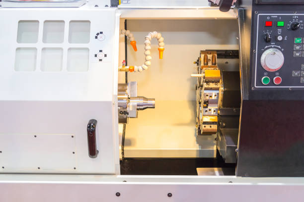 istock Steel metal cutting machine process by CNC lathe in workshop 1069201156