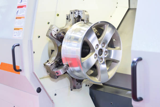 istock Car alloy new rim milling and machine process by CNC lathe in workshop 1069201180