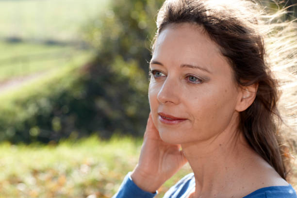 istock Woman in the sun 1069203958