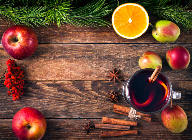 istock Hot mulled wine with spices, orange, rowanberries and apples. 1069204088