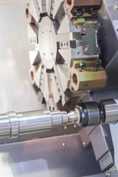 istock Steel metal cutting machine process by CNC lathe in workshop 1069204660