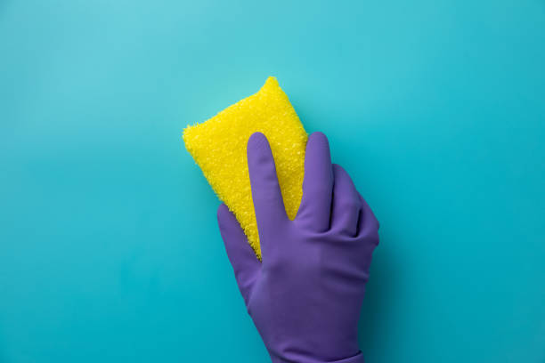istock cleaning on blue background. Cleaning or housekeeping concept background. Flat lay, Top view. 1069220922
