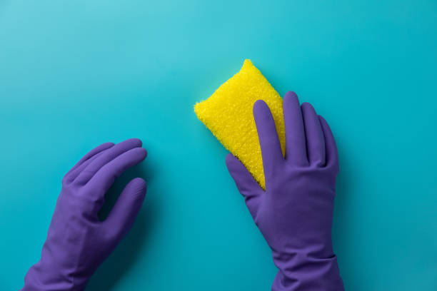 istock cleaning on blue background. Cleaning or housekeeping concept background. Flat lay, Top view. 1069221008
