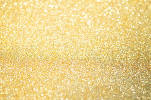 istock Abstract gold glitter bokeh lights with soft light background. 1069221312
