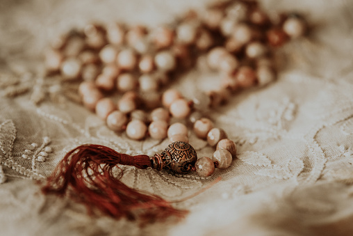 Prayer breads on top of lace. Close up