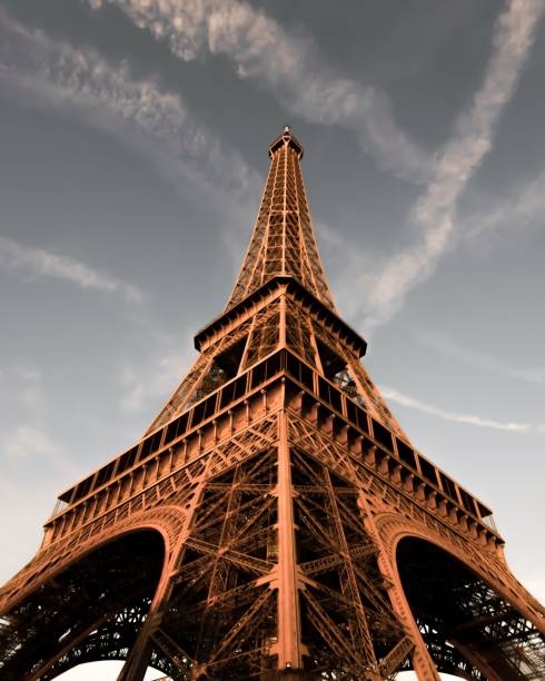 Beautiful Blue Sky Behind the Eiffel Tower in Paris, France Beautiful Blue Sky Behind the Eiffel Tower in Paris, France musee du louvre stock pictures, royalty-free photos & images
