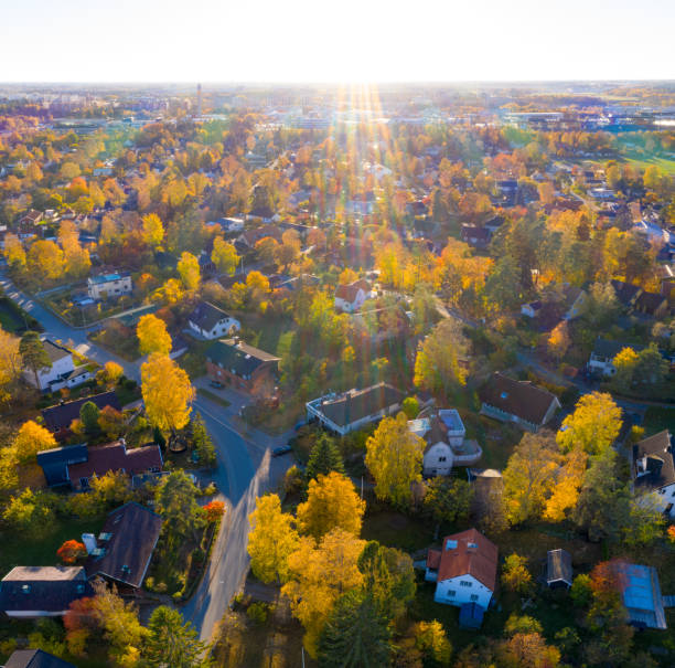 istock Flying over villa and tree area just at sunset 1069227624