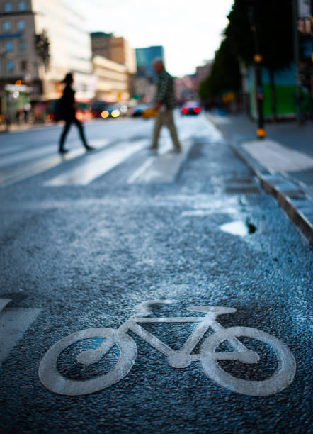 istock Bike lane and traffic. It's fall, low sun 1069227722