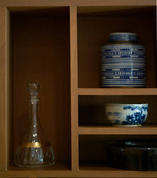 istock ceramics and glass bottle decorated on wood shelf 1069228740