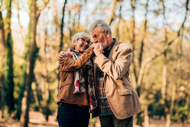 istock Man kissing his wife's hand 1069229172