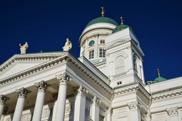 istock Close-up of Helsinki cathedral with columns in front of blue sky 1069230902