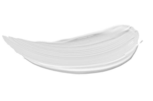 close up of beauty cream isolated on white on white close up of beauty cream isolated on white on white background moisturizing cream stock pictures, royalty-free photos & images