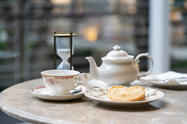 Tea set and palmier, food background.