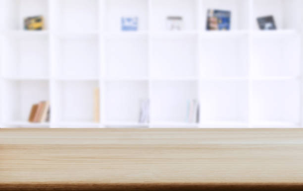 istock Selected focus empty old wooden table and Library or Bookstore blur background with bokeh image. for your photomontage or product display 1069232888