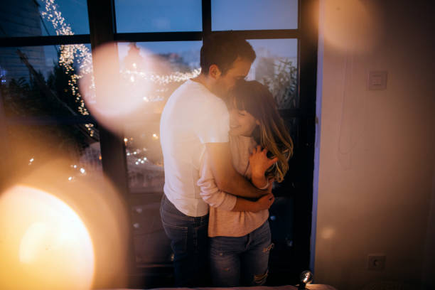 istock Tight hug in Christmas night 1069234620