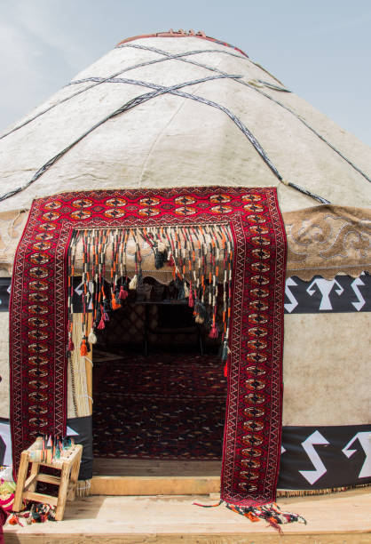 istock Yurt is a circular tent of skins on a collapsible framework, used by nomads in Mongolia, Siberia, and Turkey. 1069235514