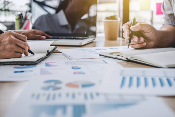istock Business team meeting working with new startup project, discussion and analysis data the charts and graphs, laptop using, Business finances and accounting concept 1069238432