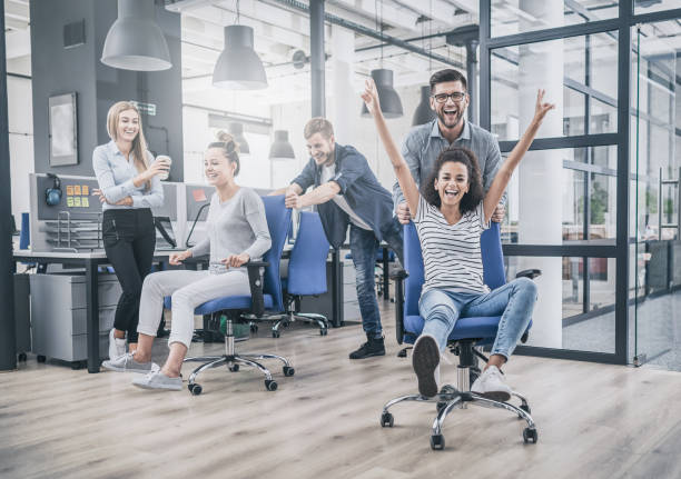 istock Young people having fun in the office. Happy team. 1069238926